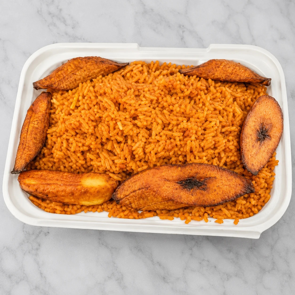 Jollof Rice with Asun and plantain - Nigerian rice dishes at Oddysamm's Menu Winnipeg